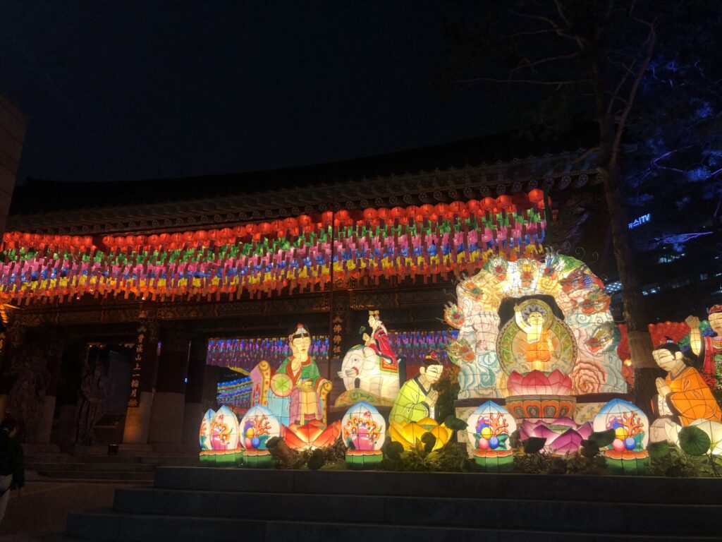 Korean temple illuminated at night with colorful lanterns during Buddha’s Birthday