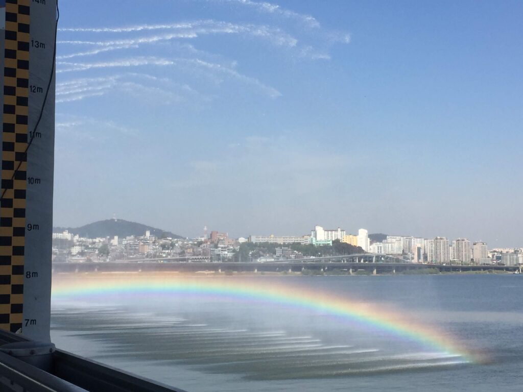 Rainbow over banpo hangang river bridge